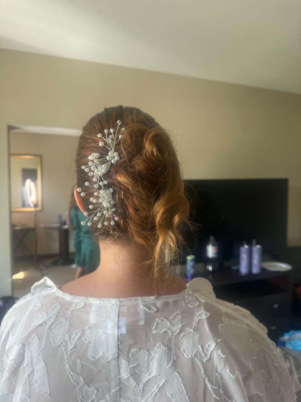 French Twist with pearl hairpiece, first angle